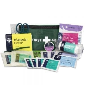 A bum bag first aid kit in green with the contents displayed