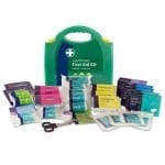 A large workplace first aid kit in green which is BS8599-1 compliant. The contents are displayed