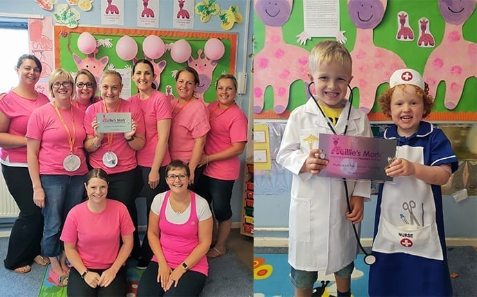 preschool staff and children pose with their Millie's mark certificates.