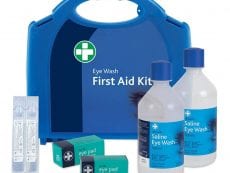 A blue eye wash first aid kit with the contents displayed.