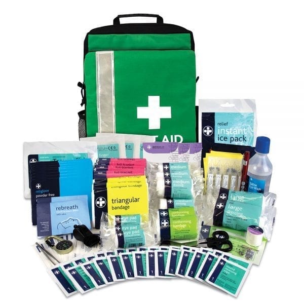 A large green evacuation first aid kit with all the contents displayed.
